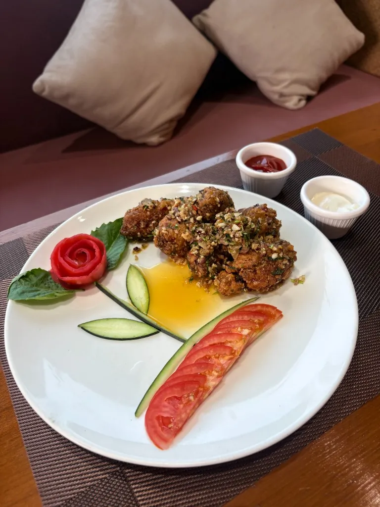 Garlic Fried Chicken — Crispy, herb-topped starters from the kitchen